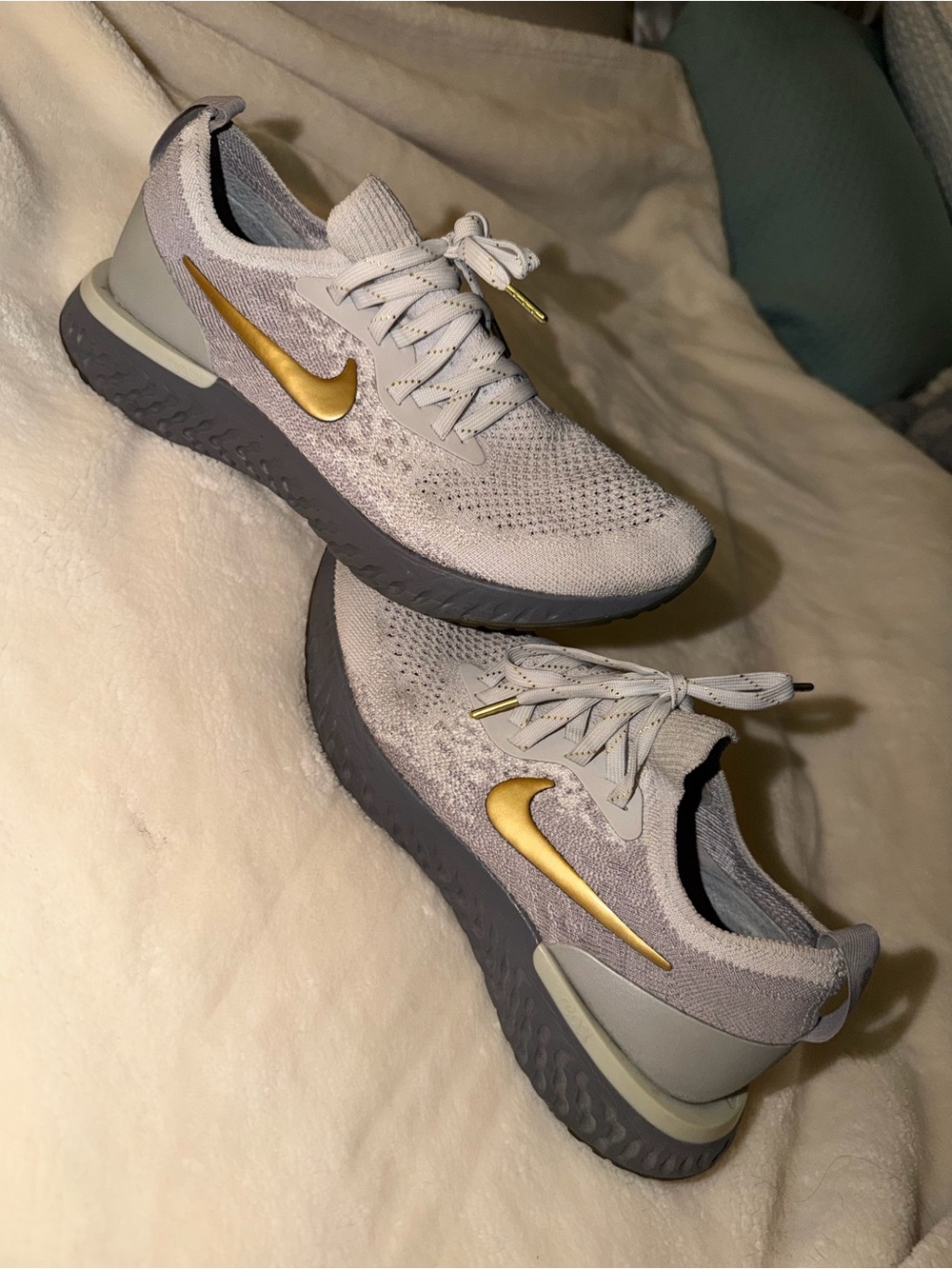 Nike Women's Light Gray Knit Running Shoes with Gold Swoosh